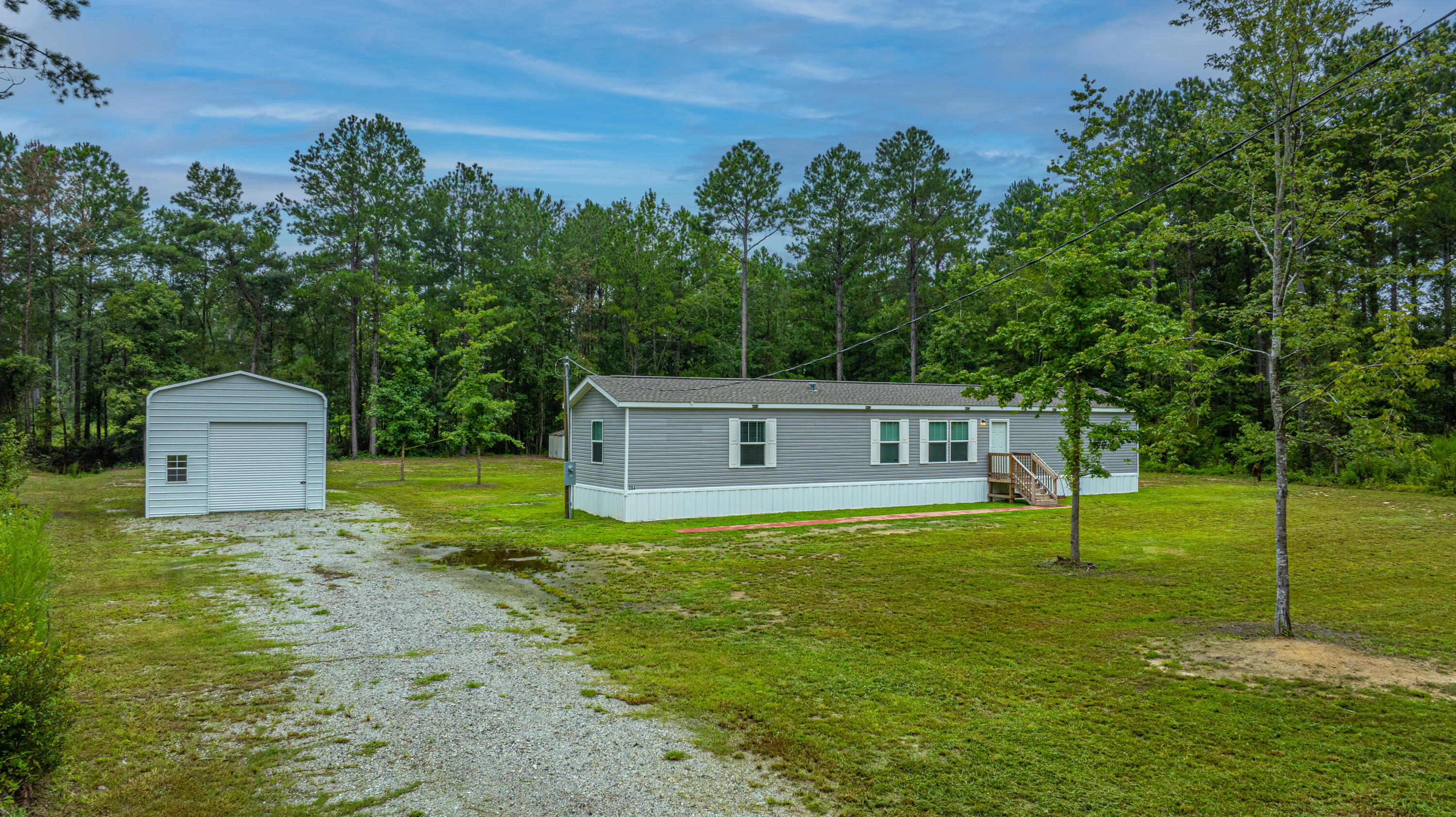 204 Wyman Road Eutawville, SC 29048 - Photo 7 of 40 Front Exterior/ Metal Building