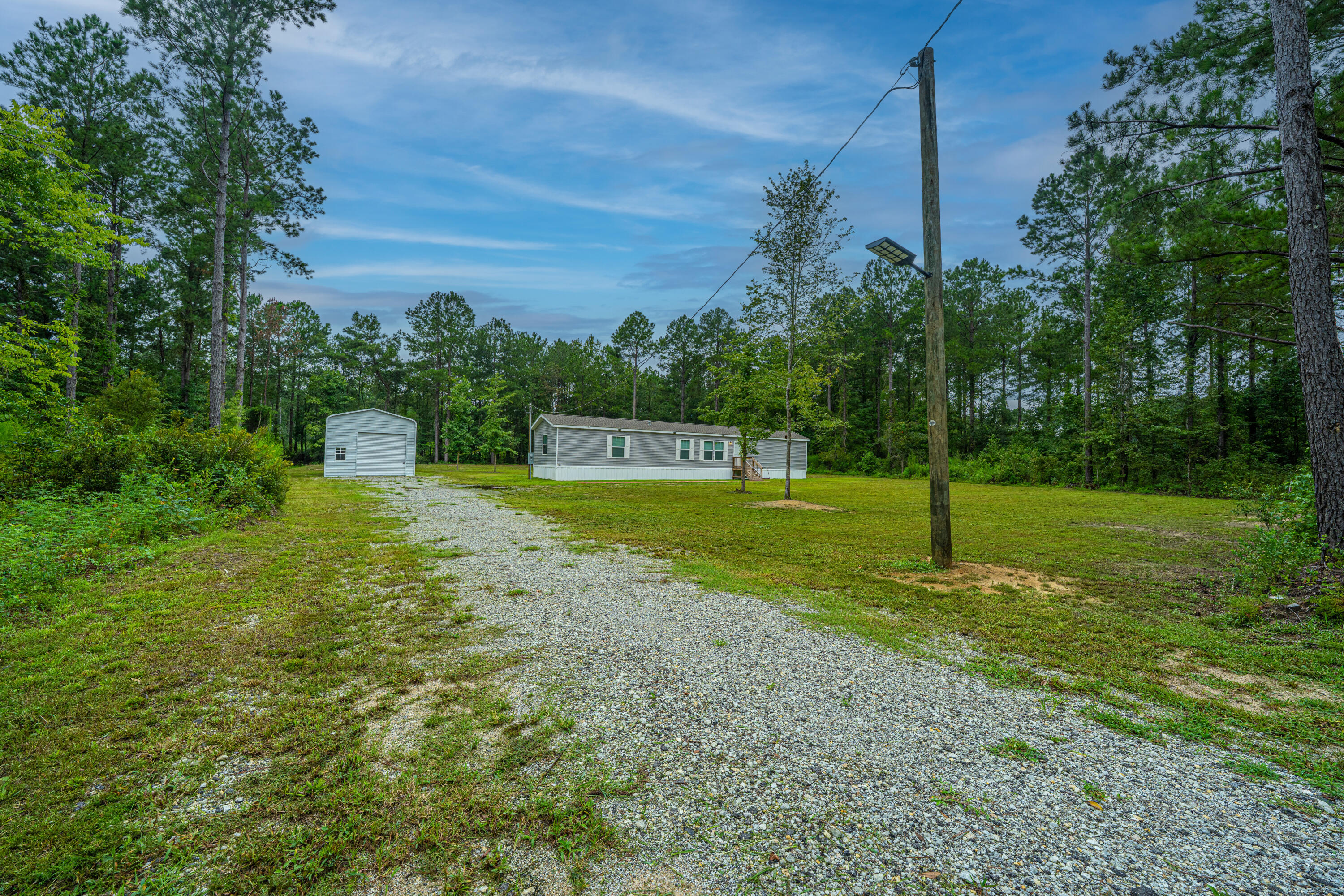 204 Wyman Road Eutawville, SC 29048 - Photo 9 of 40 Gravel Driveway