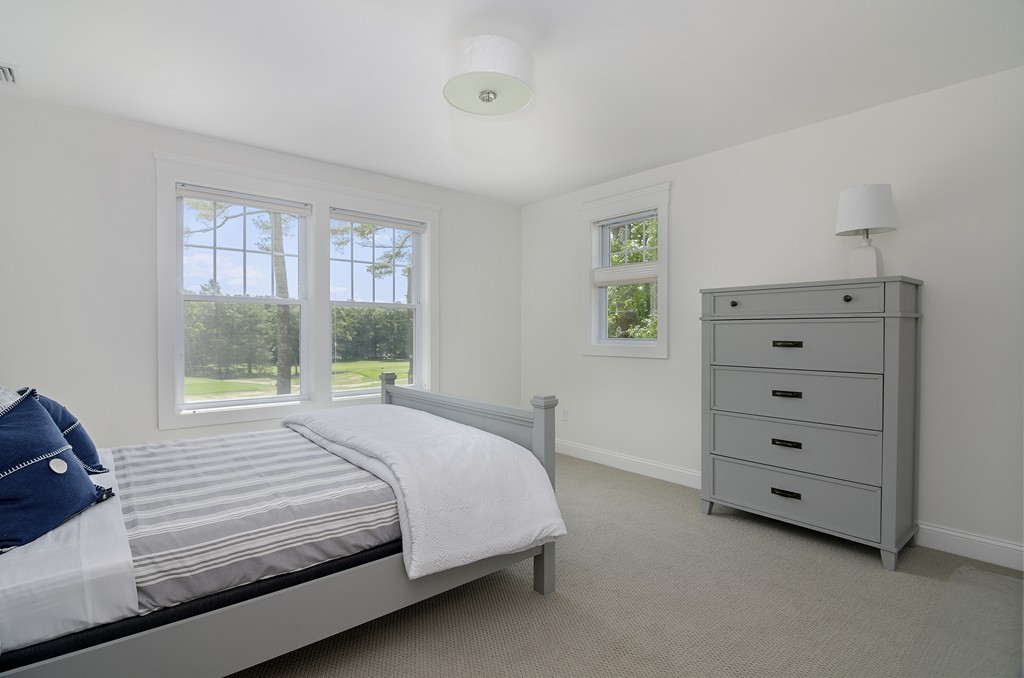 42 Cahoon Road, Unit LOT 5 Wareham, MA 02532 - Photo 11 of 16 a bedroom with a bed and a window