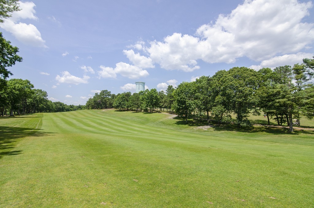 42 Cahoon Road, Unit LOT 5 Wareham, MA 02532 - Photo 13 of 16 a view of a golf course with a lake