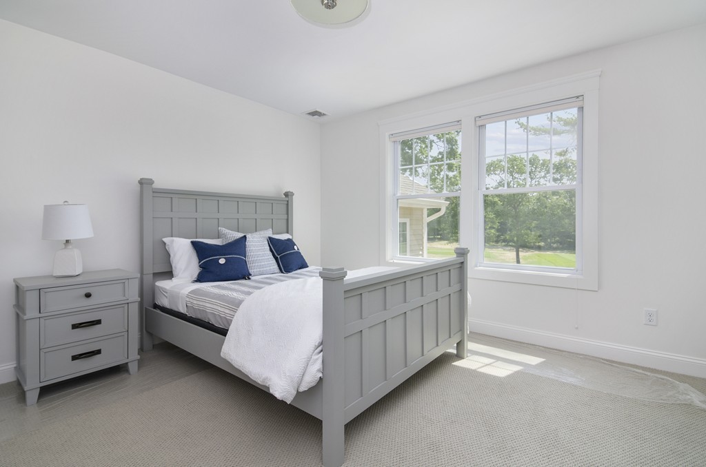 42 Cahoon Road, Unit LOT 5 Wareham, MA 02532 - Photo 10 of 16 a bedroom with a bed and a window