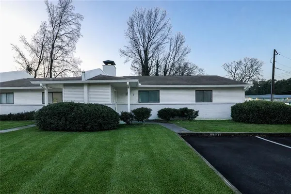 a view of a house with a garden
