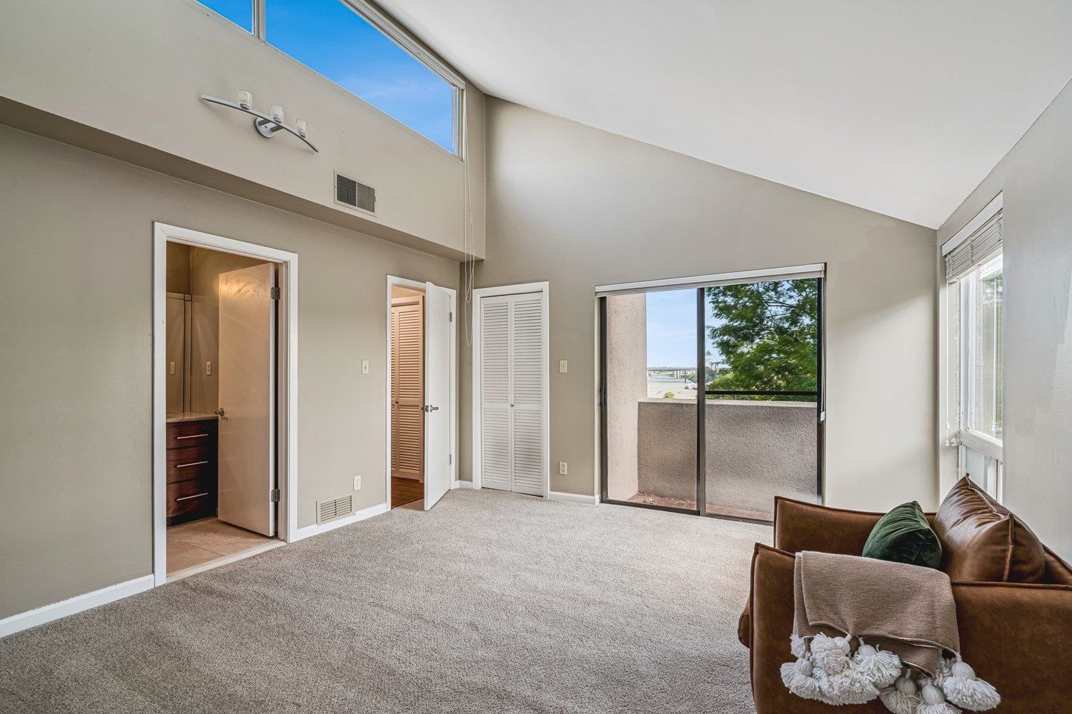 335 Riverbluff Place, Unit 2 Memphis, TN 38103 - Photo 15 of 21 a living room with furniture and a large window