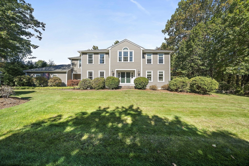 48 Lexington Circle Holden, MA 01520 - Photo 1 of 42 a front view of a house with a yard