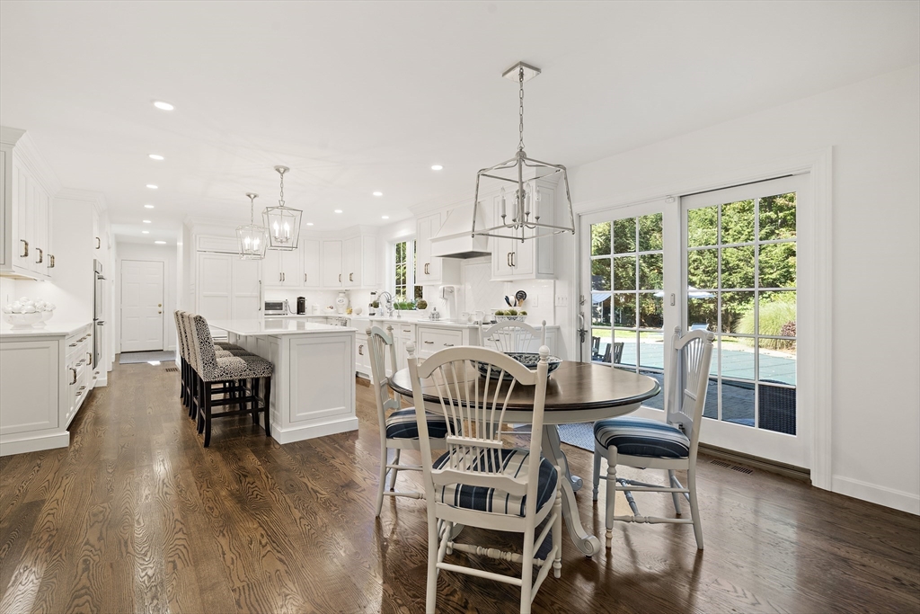 48 Lexington Circle Holden, MA 01520 - Photo 12 of 42 a view of a dining room with furniture window and wooden floor