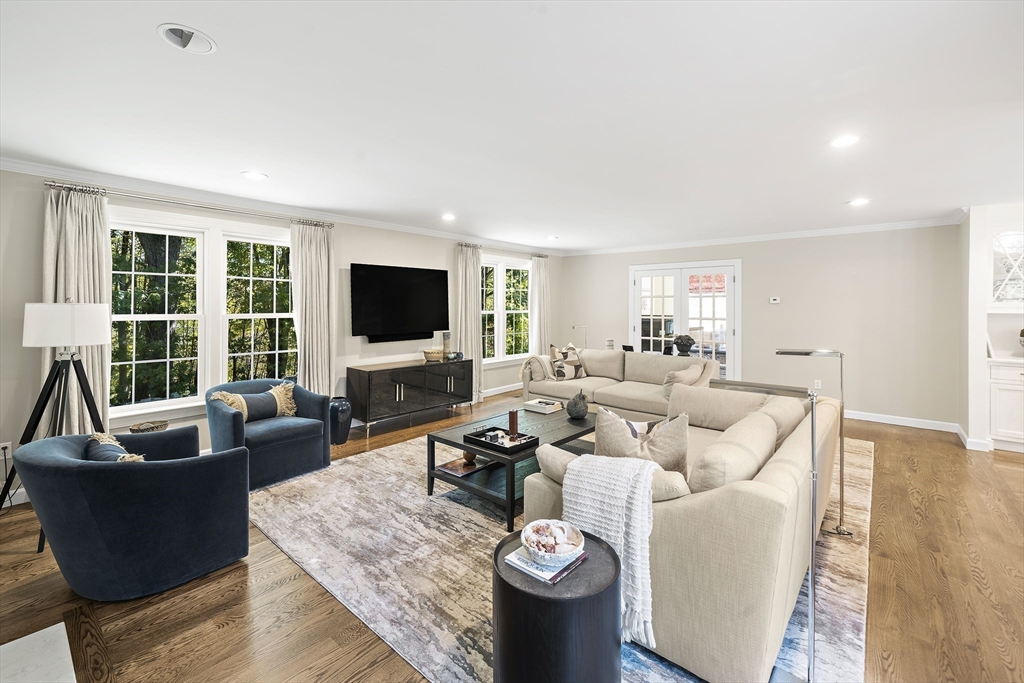 48 Lexington Circle Holden, MA 01520 - Photo 14 of 42 a living room with furniture and a flat screen tv