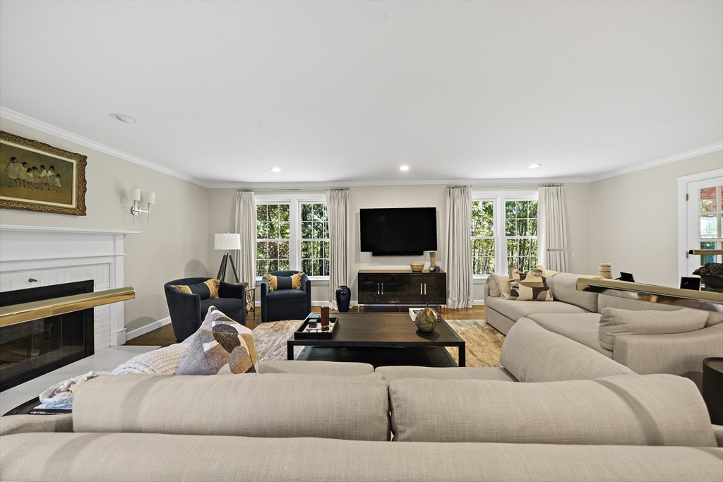 48 Lexington Circle Holden, MA 01520 - Photo 18 of 42 a living room with furniture and a flat screen tv
