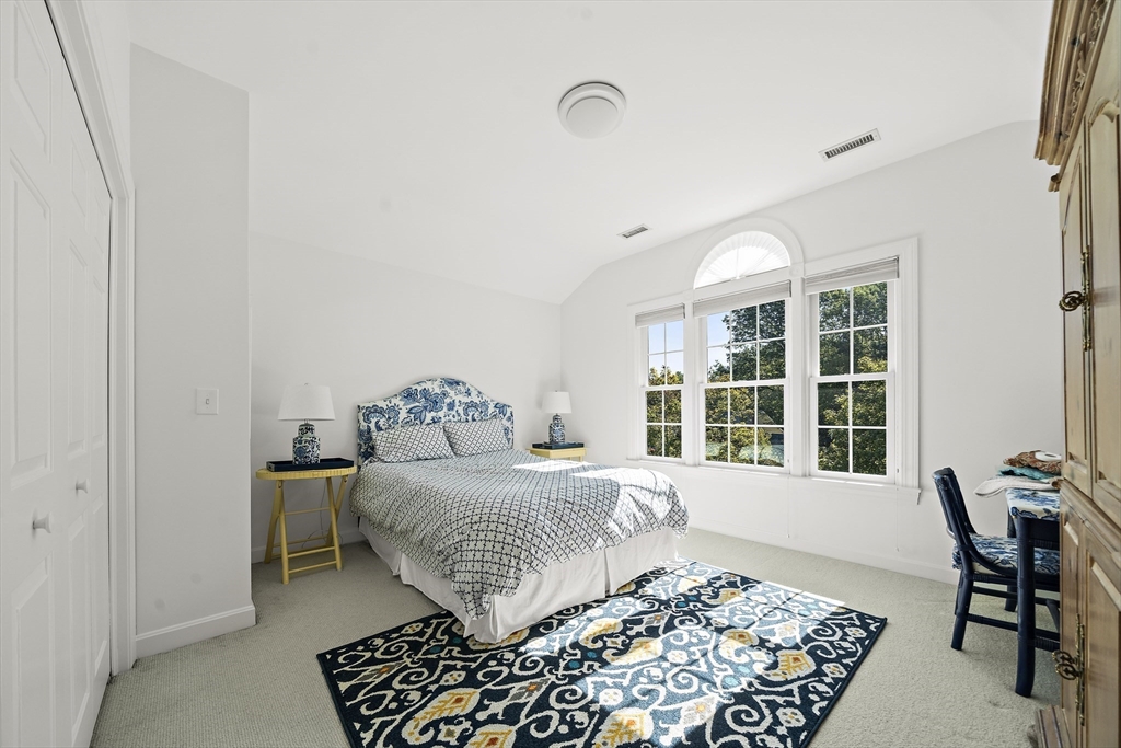 48 Lexington Circle Holden, MA 01520 - Photo 29 of 42 a bedroom with a bed and a window