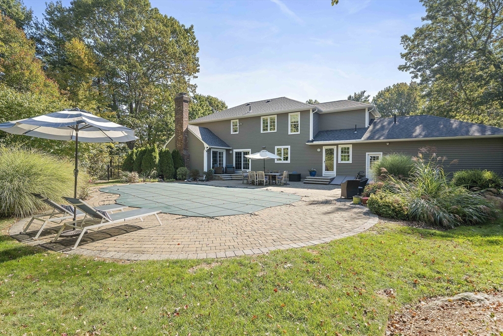 48 Lexington Circle Holden, MA 01520 - Photo 38 of 42 a front view of a house with a yard and trees