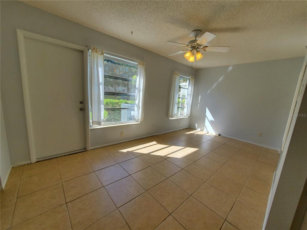 2461 Rhodesian Drive, Unit 19 Clearwater, FL 33763 - Photo 15 of 28 a view of livingroom with window