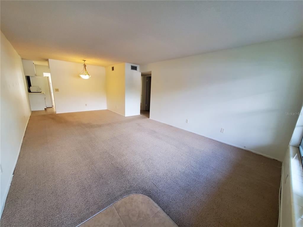 2461 Rhodesian Drive, Unit 19 Clearwater, FL 33763 - Photo 4 of 28 a view of an empty room