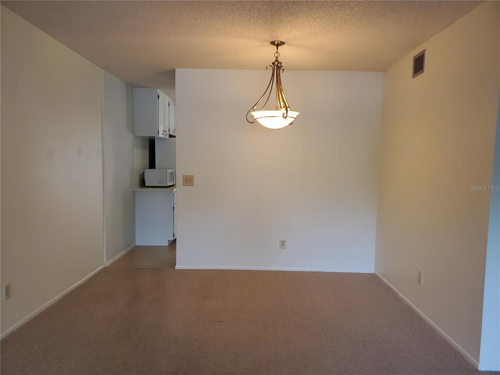 2461 Rhodesian Drive, Unit 19 Clearwater, FL 33763 - Photo 6 of 28 a view of empty room with a sink
