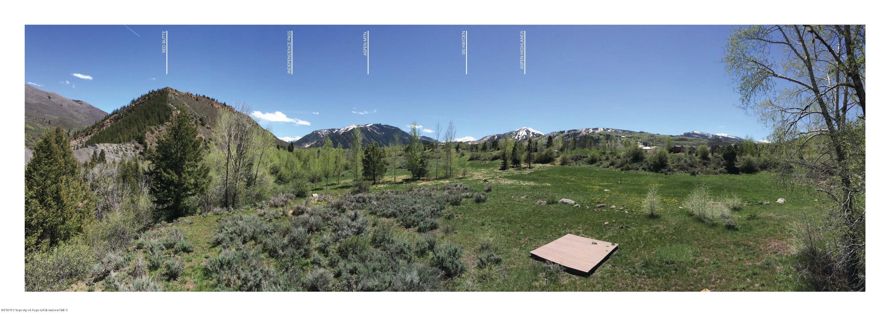 360 Coach Road Aspen, CO 81611 - Photo 17 of 33 a view of a lush green field