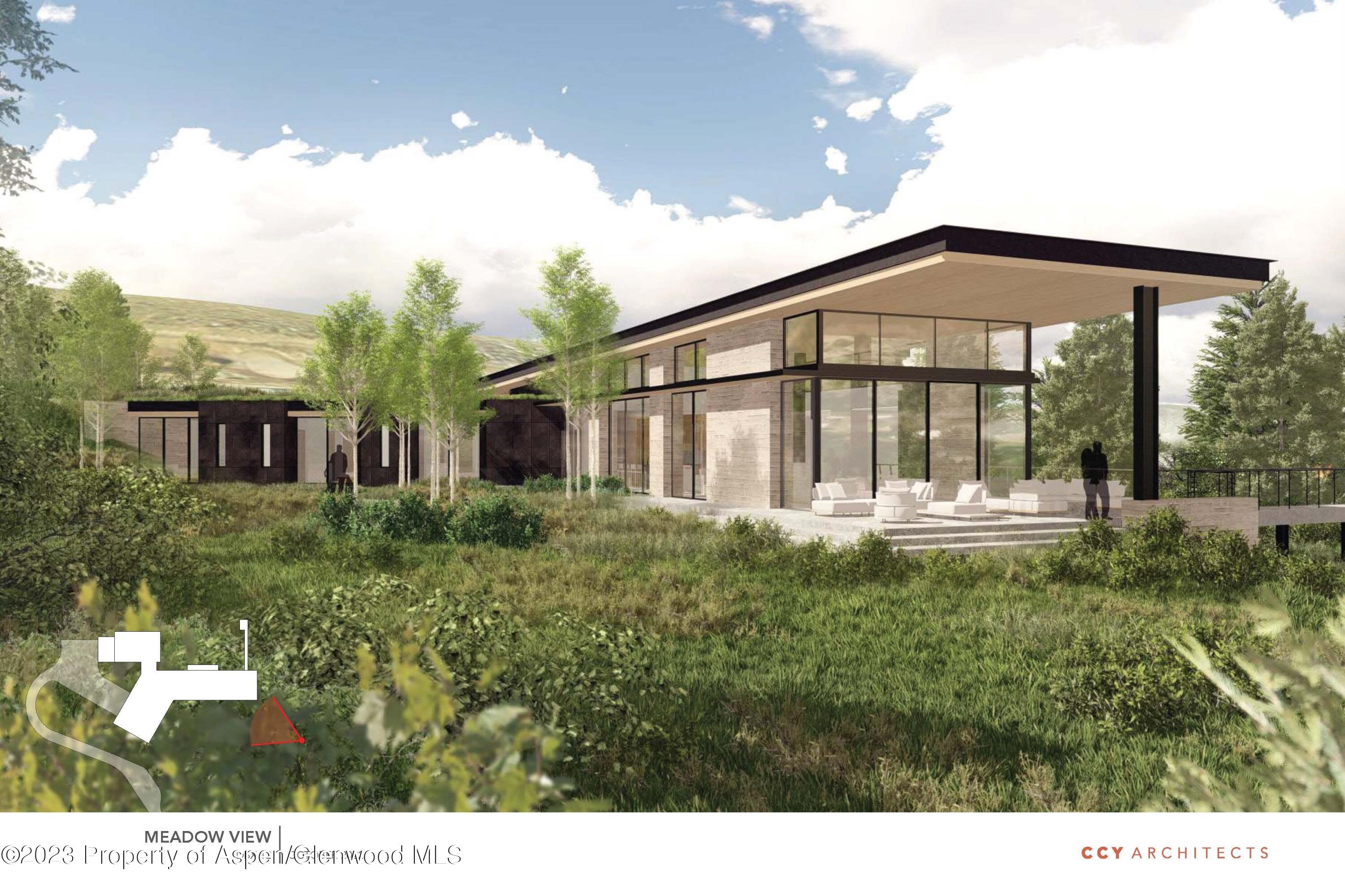 360 Coach Road Aspen, CO 81611 - Photo 30 of 33 a front view of a house with a garden