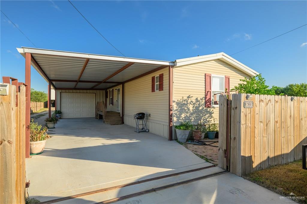 36338 Marshall Hutts Road Rio Hondo, TX 78583 - Photo 1 of 42 a view of a house with backyard