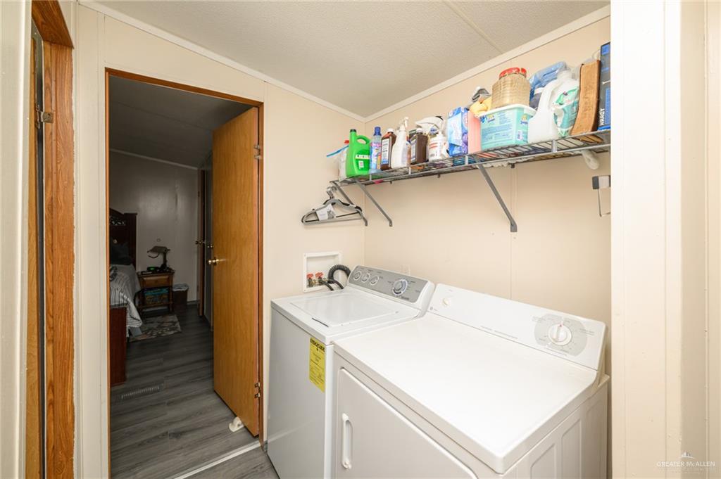 36338 Marshall Hutts Road Rio Hondo, TX 78583 - Photo 27 of 42 a utility room with dryer and washer