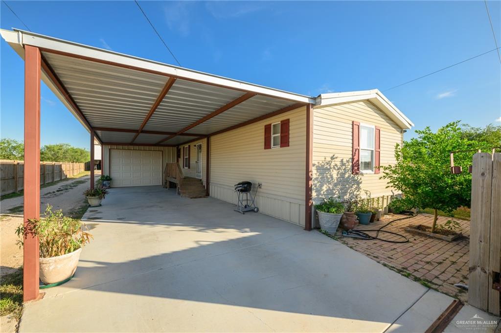 36338 Marshall Hutts Road Rio Hondo, TX 78583 - Photo 31 of 42 a view of a backyard