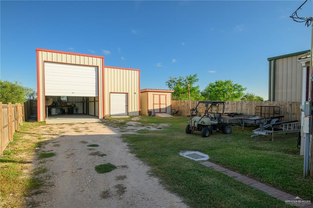 36338 Marshall Hutts Road Rio Hondo, TX 78583 - Photo 38 of 42 a backyard of a house with seating space