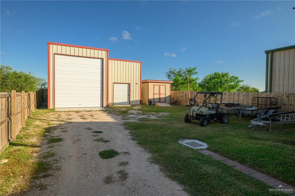 36338 Marshall Hutts Road Rio Hondo, TX 78583 - Photo 39 of 42 a view of a house with backyard and sitting area