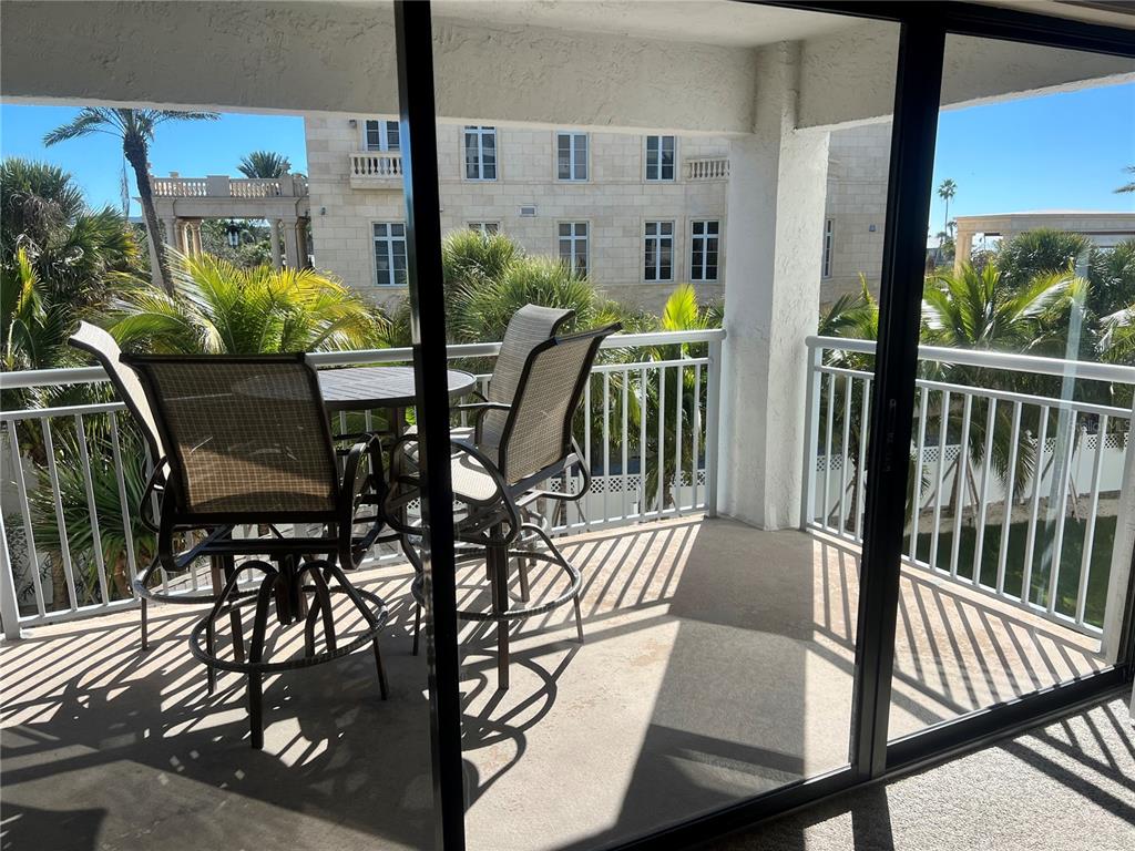1001 Point Of Rocks Road, Unit 309 Sarasota, FL 34242 - Photo 11 of 38 a view of balcony and patio