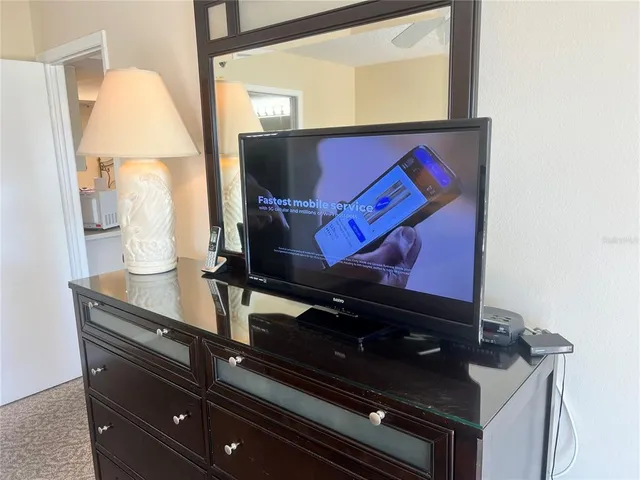 a bathroom with a sink double vanity and a toilet