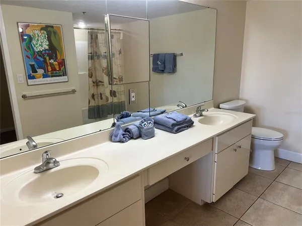 a bathroom with a shower and a tub