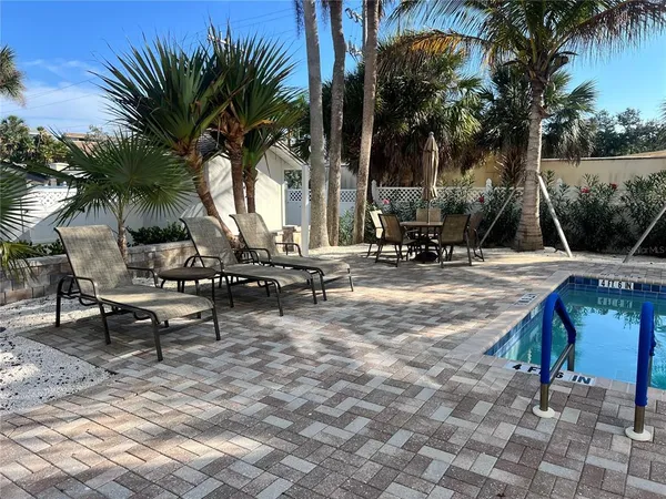 a front view of house with yard and seating area