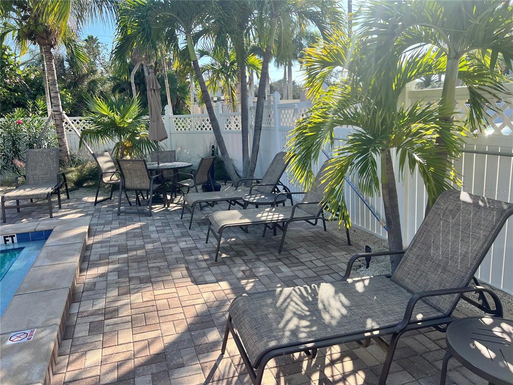 1001 Point Of Rocks Road, Unit 309 Sarasota, FL 34242 - Photo 27 of 38 a view of outdoor space with seating area