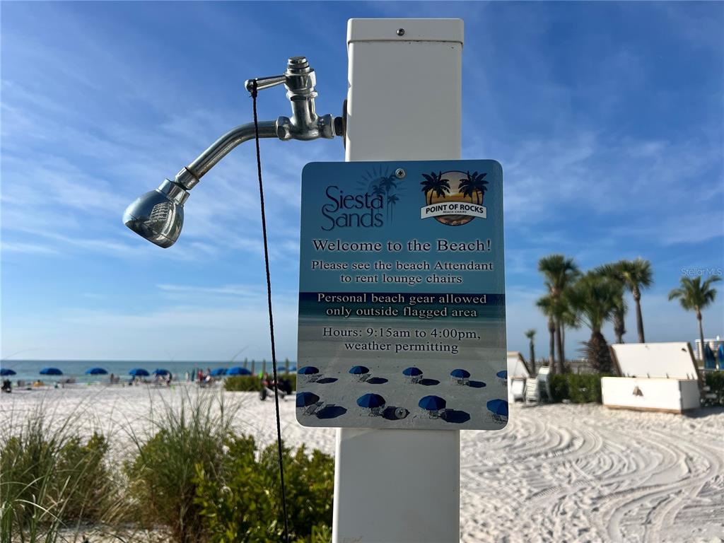 1001 Point Of Rocks Road, Unit 309 Sarasota, FL 34242 - Photo 38 of 38 a view of a bedroom with a bed and potted plants