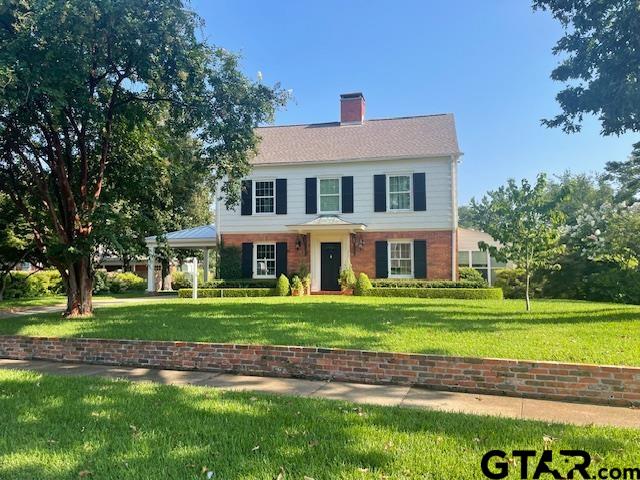 114 East 2nd Street Tyler, TX 75701 - Photo 1 of 48 a front view of a house with a yard
