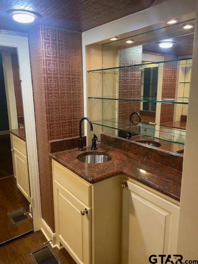114 East 2nd Street Tyler, TX 75701 - Photo 16 of 48 a kitchen with a sink and a refrigerator