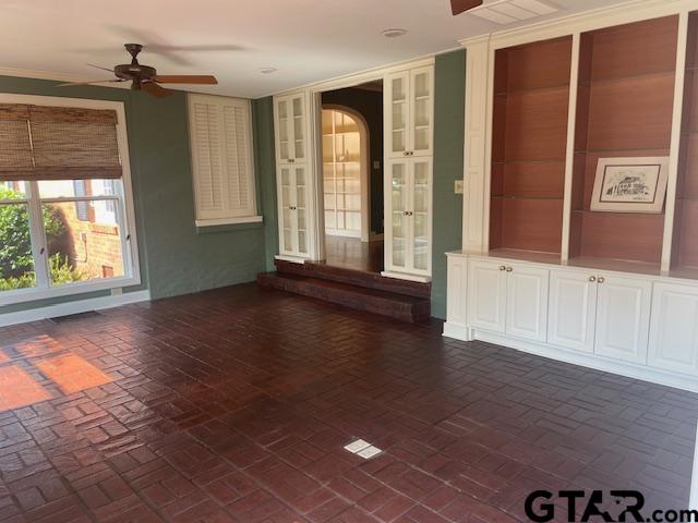 114 East 2nd Street Tyler, TX 75701 - Photo 17 of 48 a view of an empty room with wooden floor and a window