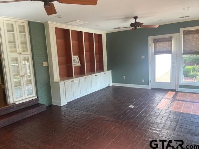 114 East 2nd Street Tyler, TX 75701 - Photo 19 of 48 wooden floor and windows in an empty room