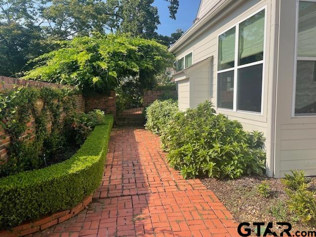 114 East 2nd Street Tyler, TX 75701 - Photo 20 of 48 a view of a garden with pathway