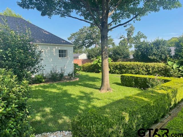 114 East 2nd Street Tyler, TX 75701 - Photo 22 of 48 a view of a house with a yard and plants