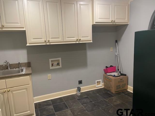 114 East 2nd Street Tyler, TX 75701 - Photo 31 of 48 a bathroom with a sink and cabinets