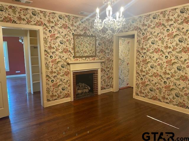 114 East 2nd Street Tyler, TX 75701 - Photo 39 of 48 a view of a livingroom with wooden floor a fireplace and windows