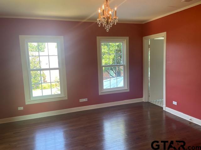 114 East 2nd Street Tyler, TX 75701 - Photo 40 of 48 an empty room with wooden floor and windows