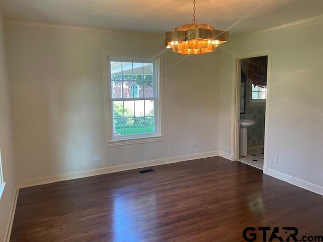 114 East 2nd Street Tyler, TX 75701 - Photo 6 of 48 an empty room with wooden floor and windows