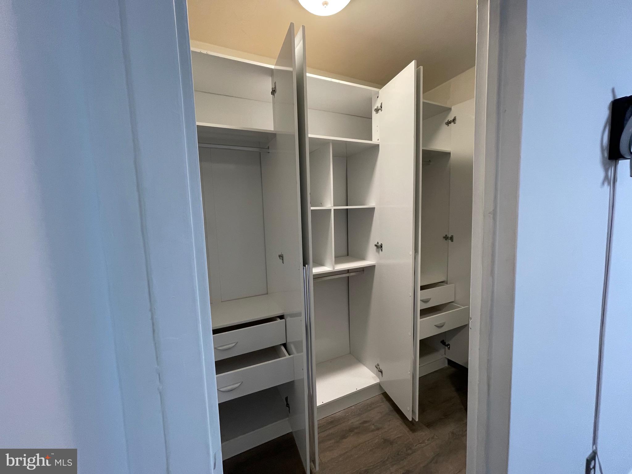 1 Scott Circle Northwest, Unit 118 Washington, DC 20036 - Photo 17 of 35 a view of walk in closet with empty racks