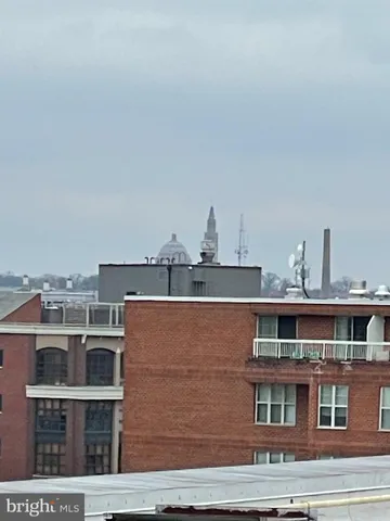 a view of a large building with a clock on it