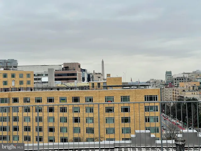 a view of a building with a street