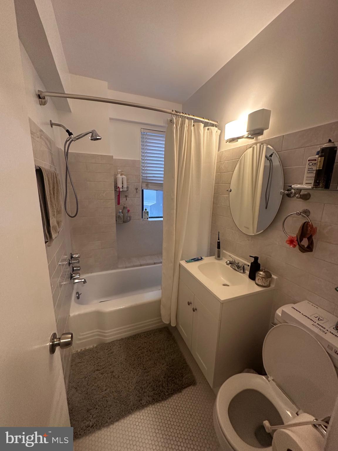 1 Scott Circle Northwest, Unit 118 Washington, DC 20036 - Photo 36 of 54 a bathroom with a sink toilet and shower