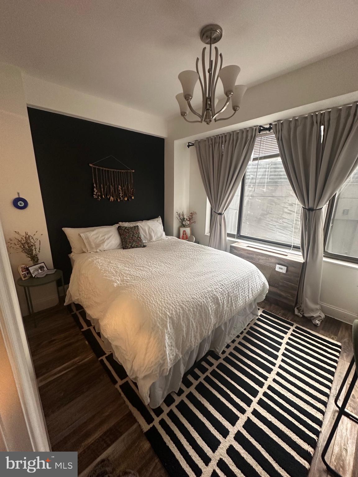 1 Scott Circle Northwest, Unit 118 Washington, DC 20036 - Photo 41 of 54 a bedroom with a bed and dresser