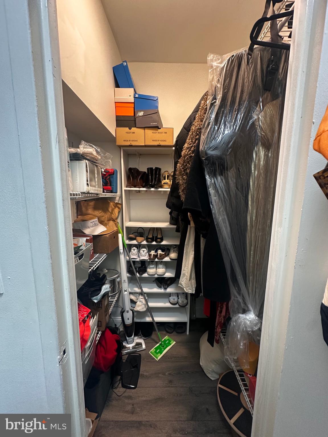 1 Scott Circle Northwest, Unit 118 Washington, DC 20036 - Photo 48 of 54 a view of walk in closet with clothes and shoes