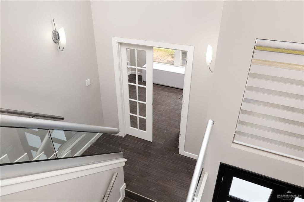 1014 Hill Country Road Edinburg, TX 78539 - Photo 15 of 31 a view of wooden floor and chair in a room
