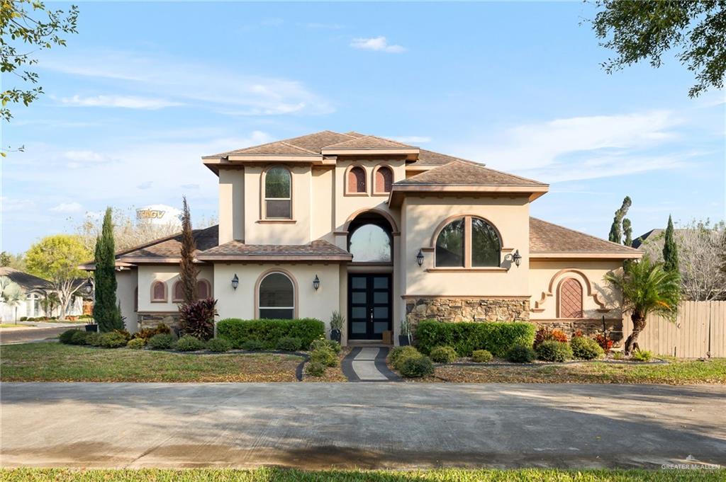 1014 Hill Country Road Edinburg, TX 78539 - Photo 27 of 31 a front view of a house with a yard