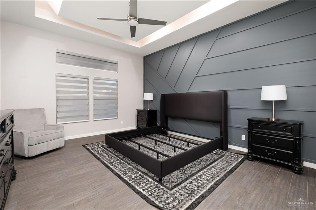 1014 Hill Country Road Edinburg, TX 78539 - Photo 29 of 31 a living room with furniture and a flat screen tv