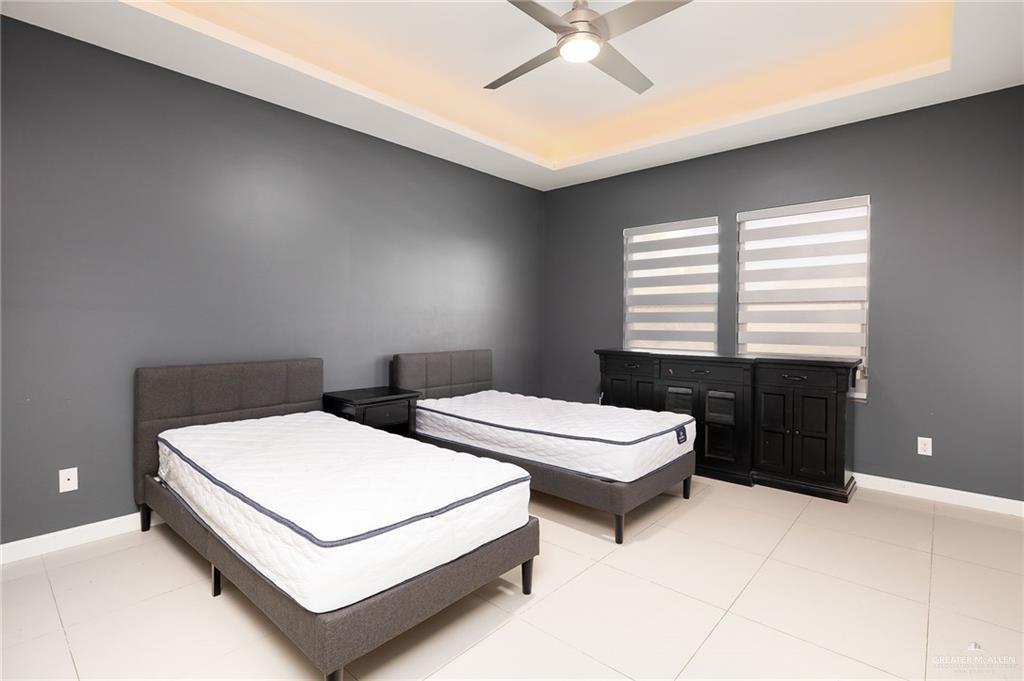 1014 Hill Country Road Edinburg, TX 78539 - Photo 31 of 31 a living room with bed and a table