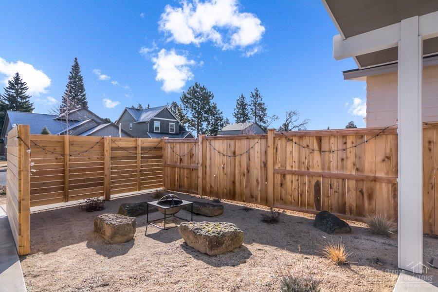 62013 Dantili Road Bend, OR 97701 - Photo 25 of 25 a view of a patio with couches and potted plants
